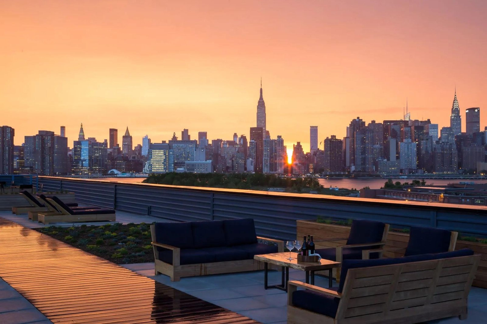Modern apartment buildings with glass facades and a clear sky
